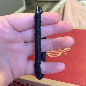 It a homemade clay beads bracelet